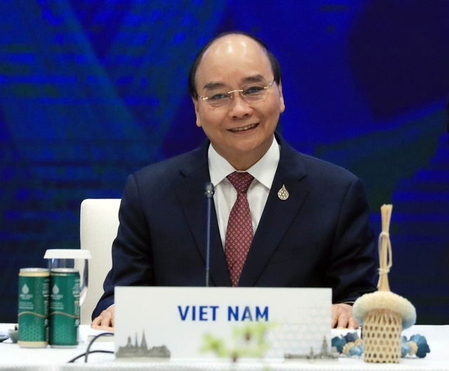 Khai mạc Tuần lễ cấp cao APEC, Chủ tịch nước Nguyễn Xuân Phúc dự phiên thảo luận đầu tiên  - Ảnh 2.